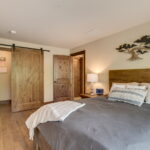 The owners suite features a large walk-in closet and beautiful solid wood doors.