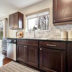 Bright stainless appliances, new faucet, an abundance amount of cabinet space, and beautiful new backsplash.