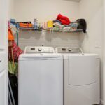 Convenience of a full washer and dryer next to the main level suite.