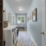 Added convenience of a second laundry room with utility sink. So nice to have laundry also on the same level as the bedrooms!